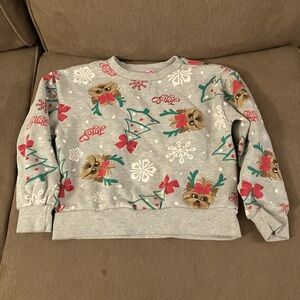 Jojo Siwa sweater. This sweater has never been worn and is size 7/8.